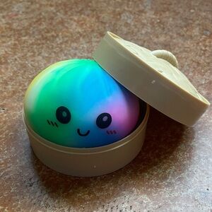 RARE multicolored Dumpling Squishy Toy